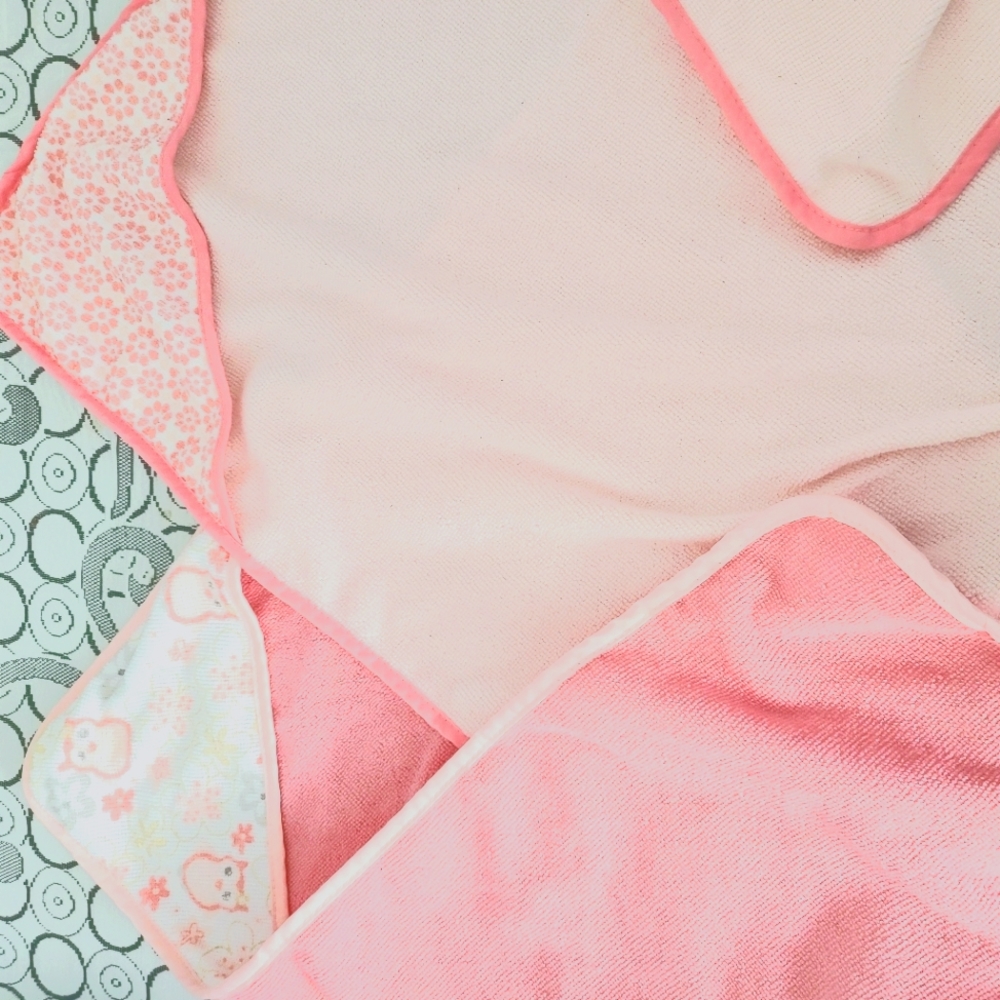 Three hooded baby towels